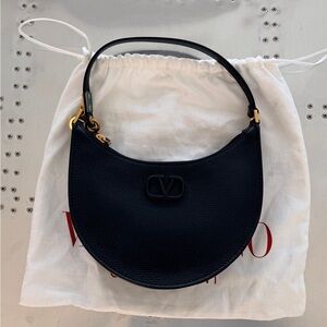 Valentino Garavani
VLOGO Mini Leather Shoulder Bag
